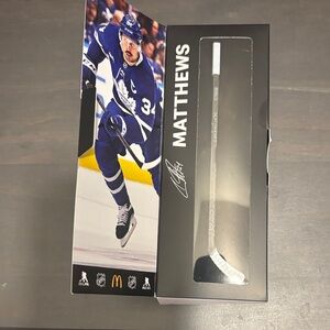 CCM Blue and White Hockey Stick with Player Graphic